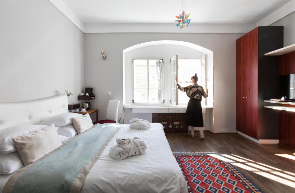 Postel nebo postele na pokoji v ubytování Design Hotel Neruda