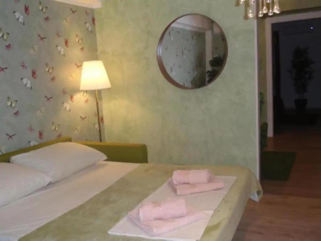 Posteľ alebo postele v izbe v ubytovaní Beach apartment Butterfly with sea view