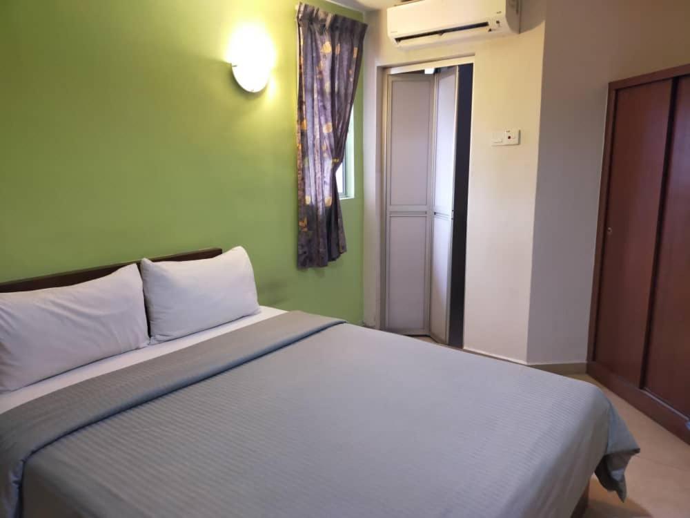 Postel nebo postele na pokoji v ubytování U HOTEL
