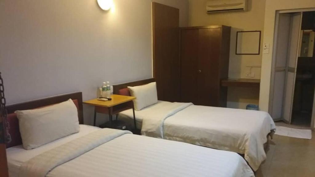 Postel nebo postele na pokoji v ubytování U HOTEL