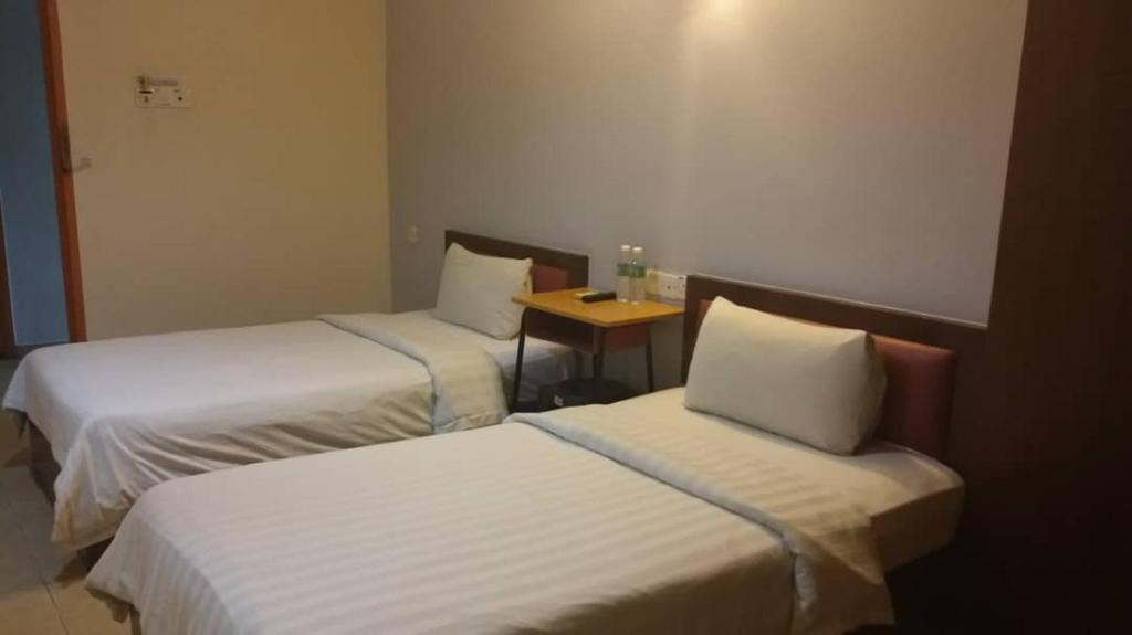 Postel nebo postele na pokoji v ubytování U HOTEL