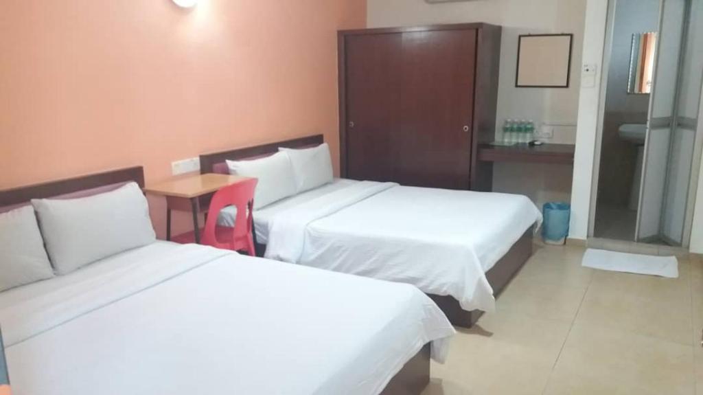 Postel nebo postele na pokoji v ubytování U HOTEL