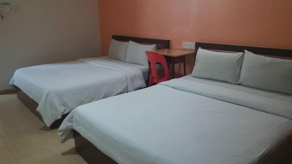 Postel nebo postele na pokoji v ubytování U HOTEL
