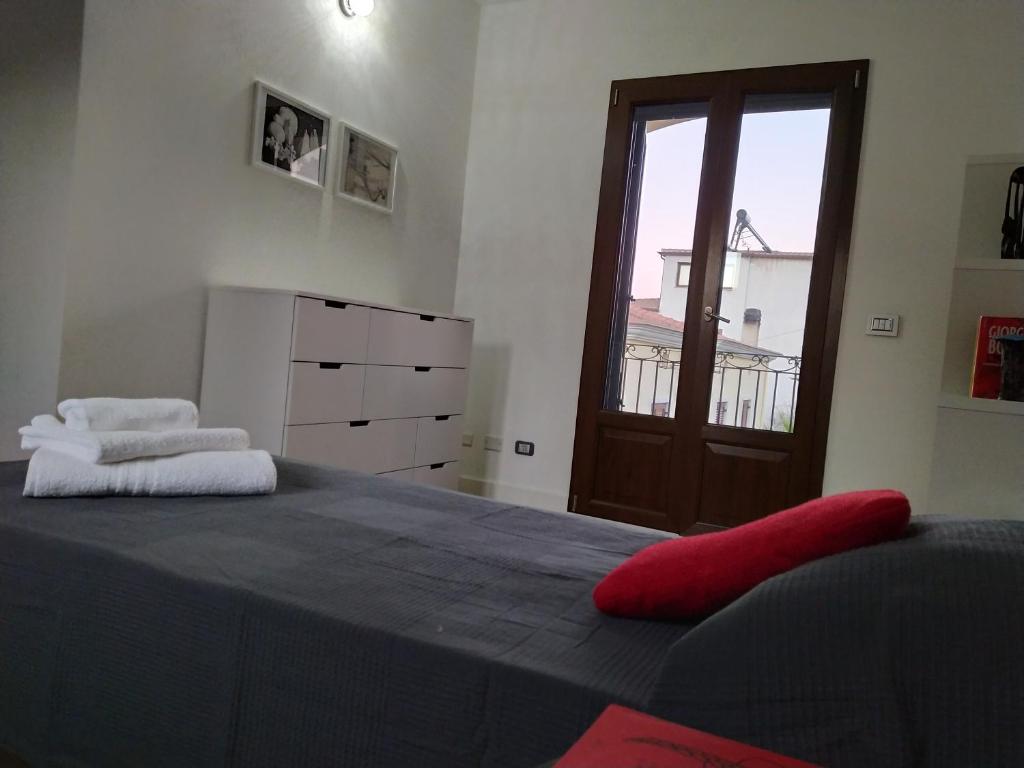 Posteľ alebo postele v izbe v ubytovaní Casa LantanaRossa