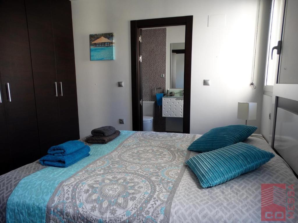 A bed or beds in a room at Apartamento Bella Vista - Aqua Nature La Mata
