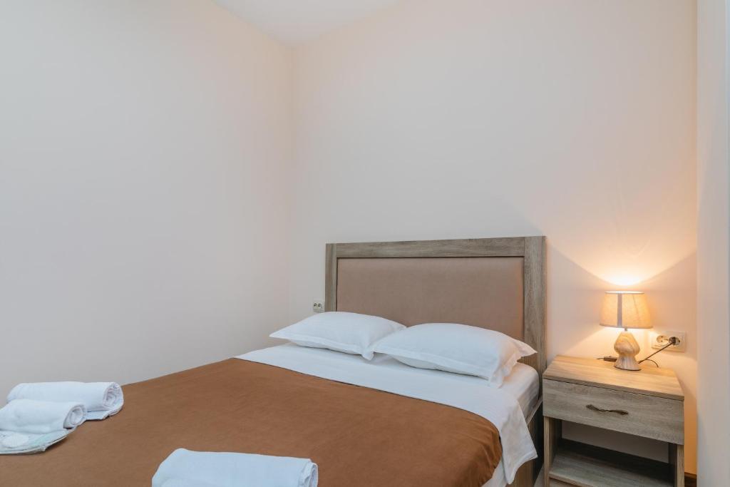 Postel nebo postele na pokoji v ubytování Gala Boutique Hotel