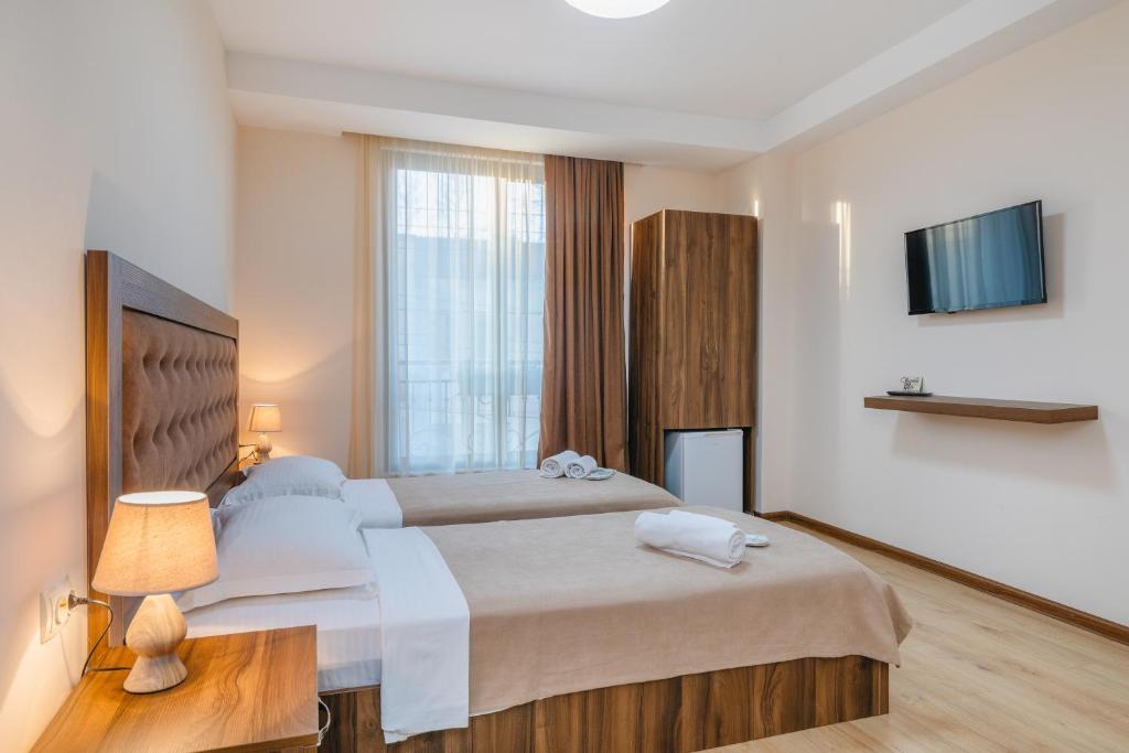 Krevet ili kreveti u jedinici u okviru objekta Gala Boutique Hotel