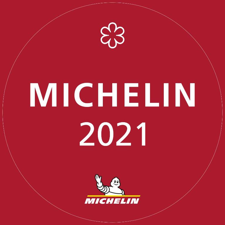 a poster for the match between michelin and michigan at Domaine Saint Clair - Le Donjon in Étretat