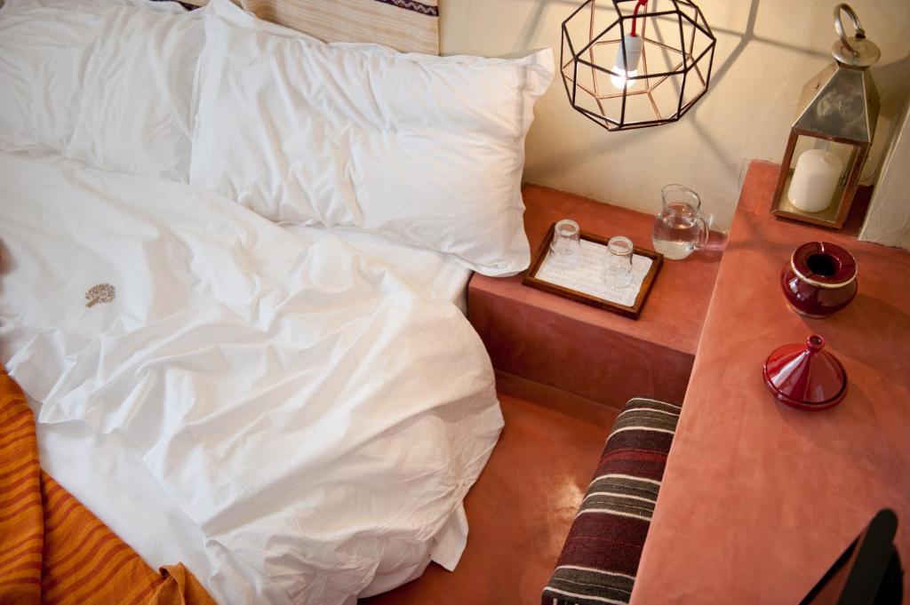 Postel nebo postele na pokoji v ubytování La Casa Dell'Arancio