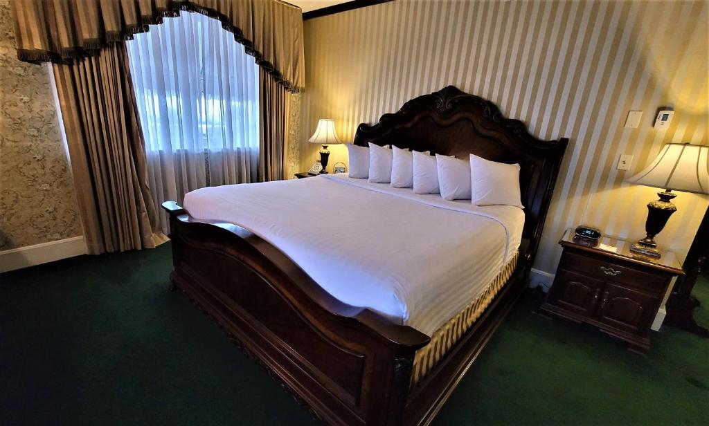Postel nebo postele na pokoji v ubytování General Palmer Hotel