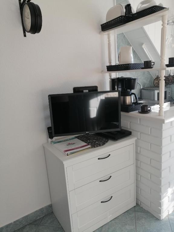 Kuchyňa alebo kuchynka v ubytovaní Gyöngyi Apartman