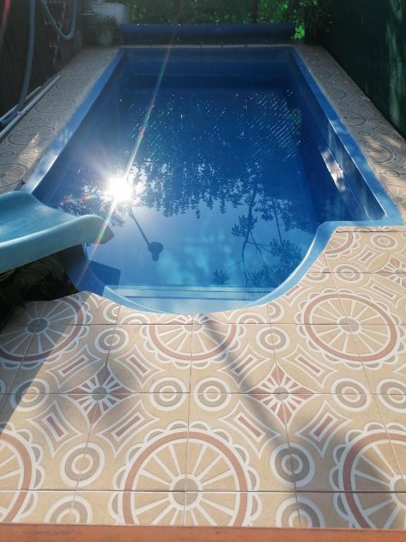 Bazén v ubytování Hospedaje San Antonio Tepoztlán. nebo v jeho okolí