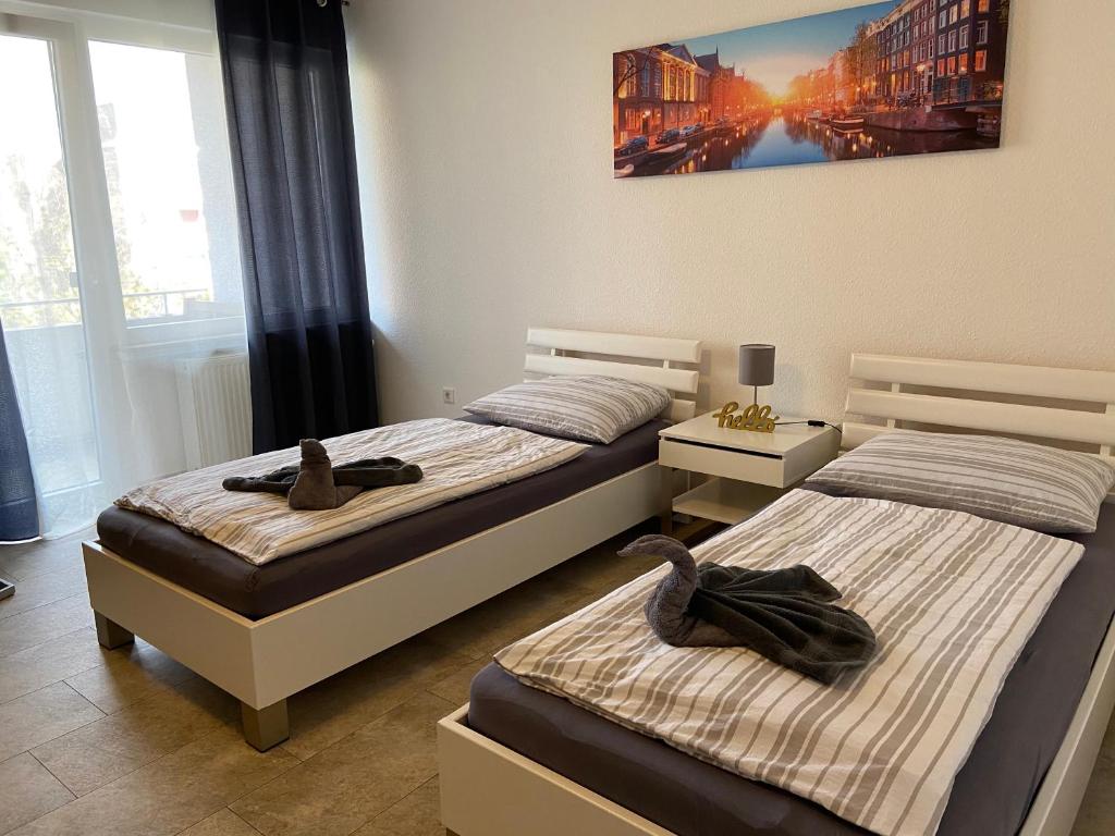 Katil atau katil-katil dalam bilik di Apartment Hannover