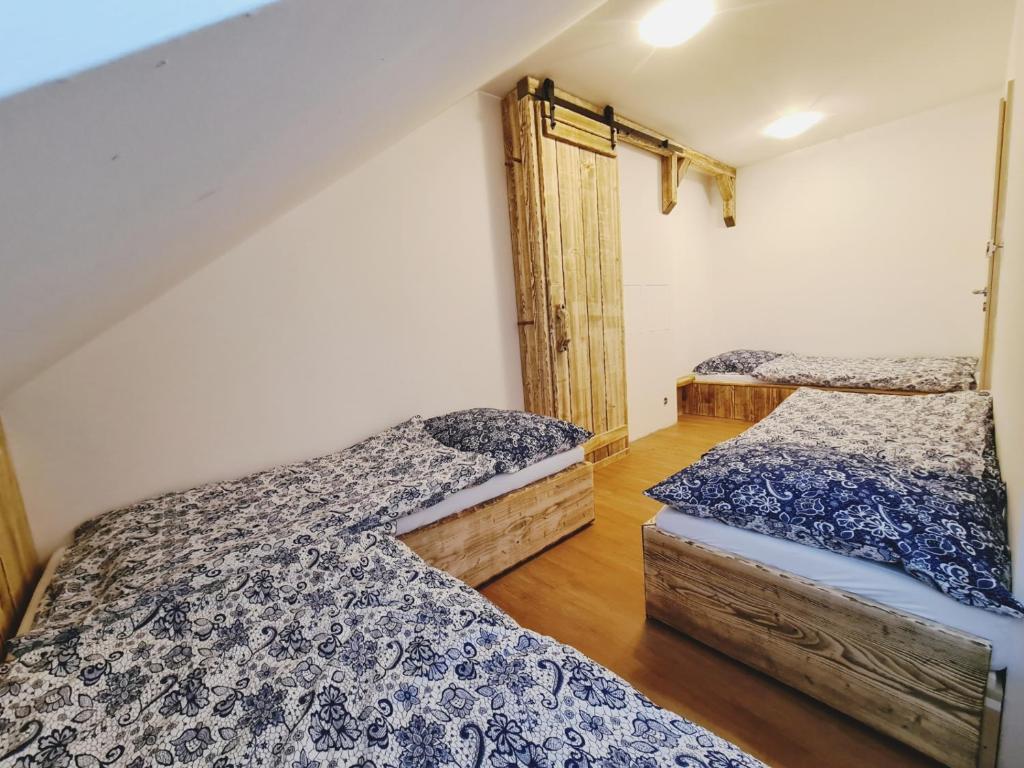 Postel nebo postele na pokoji v ubytování Apartmán Marie