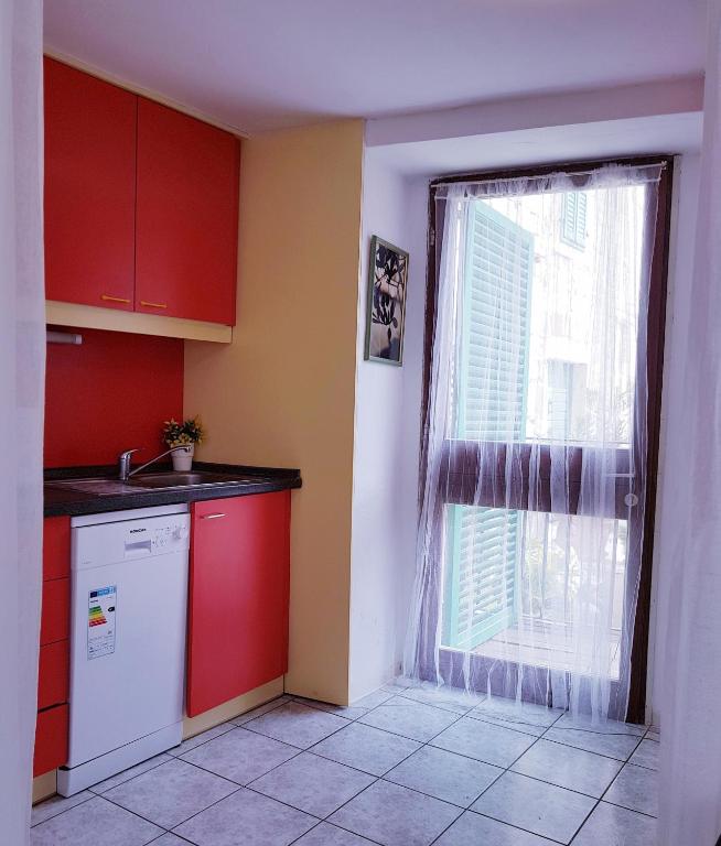 Kuchyň nebo kuchyňský kout v ubytování Apartment Obala