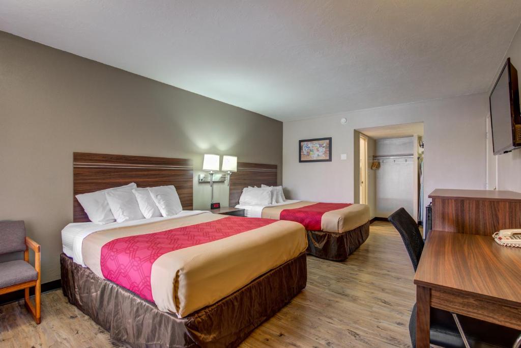 Postel nebo postele na pokoji v ubytování Econo Lodge St George North - Near Pioneer Park