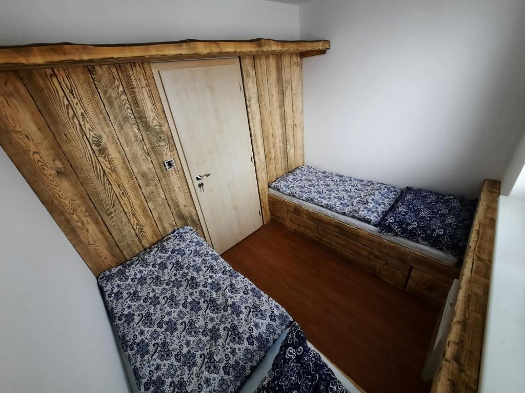 Postel nebo postele na pokoji v ubytování Apartmán Marie