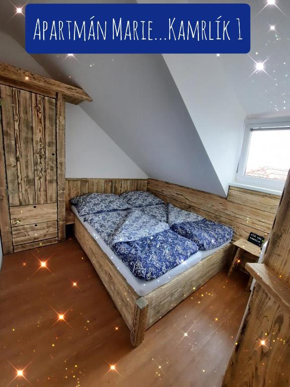 Postel nebo postele na pokoji v ubytování Apartmán Marie