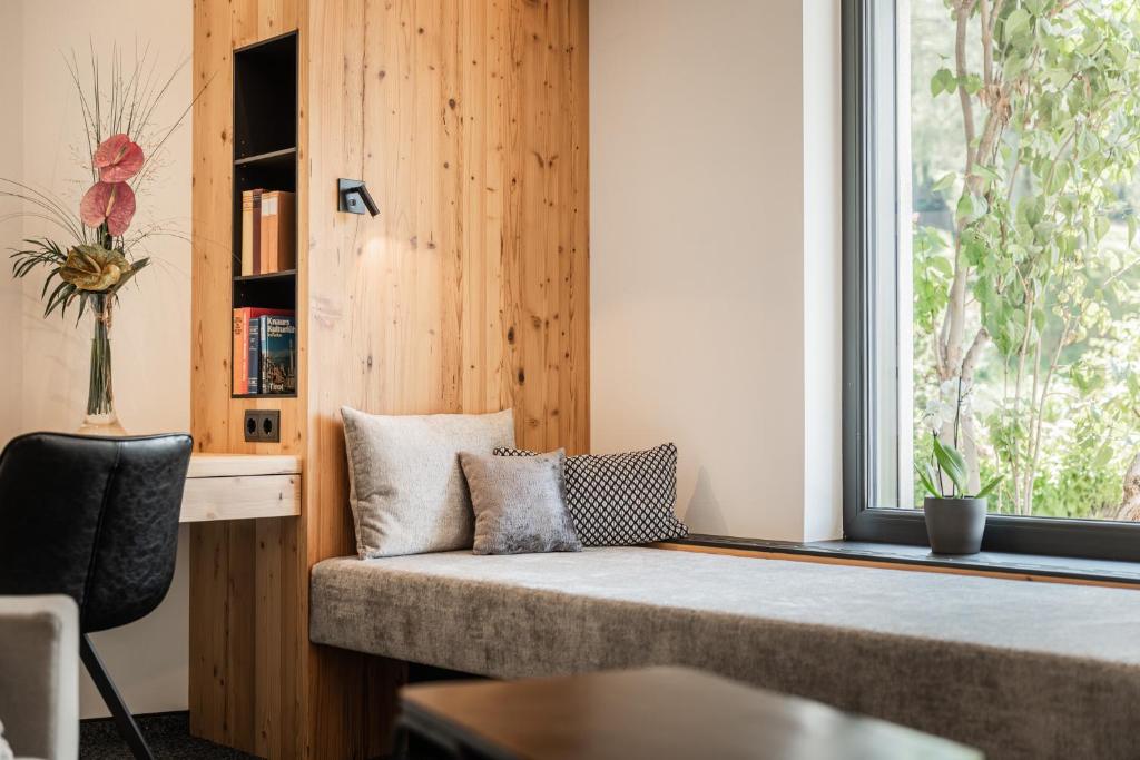 Posteľ alebo postele v izbe v ubytovaní s'Hoamatl Dorfkrug Appartements