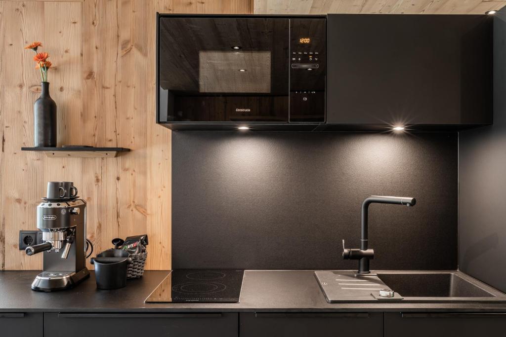 Kuchyňa alebo kuchynka v ubytovaní s'Hoamatl Dorfkrug Appartements