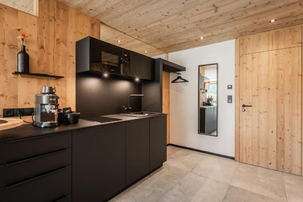 Kuchyňa alebo kuchynka v ubytovaní s'Hoamatl Dorfkrug Appartements