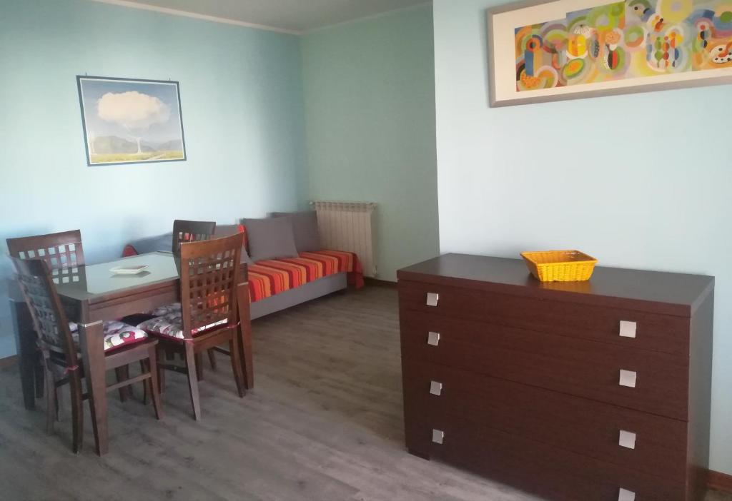 Łóżko lub łóżka w pokoju w obiekcie Romanina Appartamento Giuland