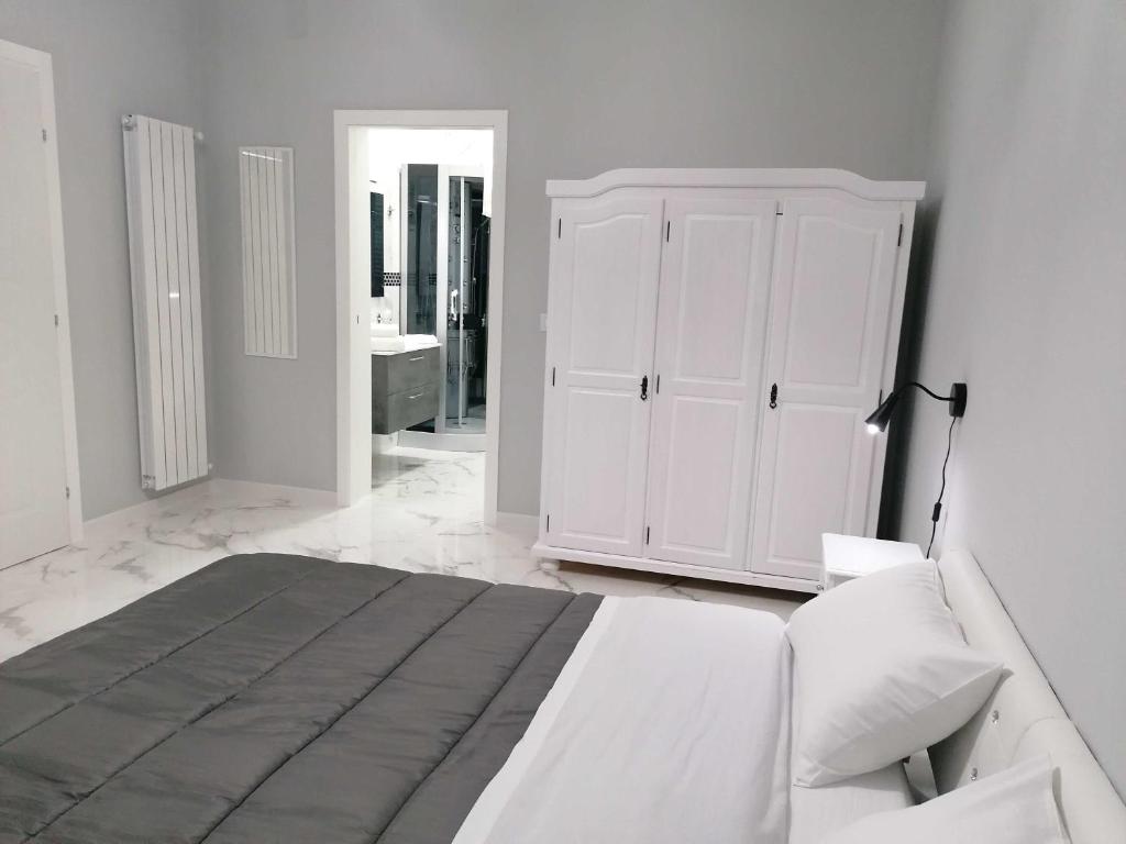Postel nebo postele na pokoji v ubytování B&B WHITE HOUSE