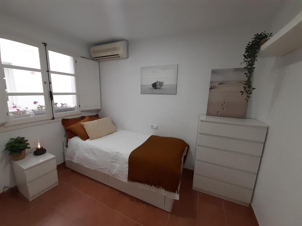 Posteľ alebo postele v izbe v ubytovaní Casa Caleta a 2 minutos de la playa