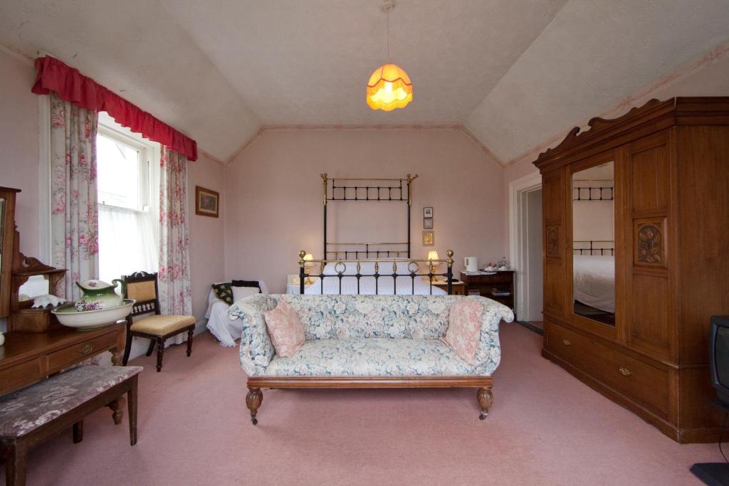Postel nebo postele na pokoji v ubytování Woodhill House