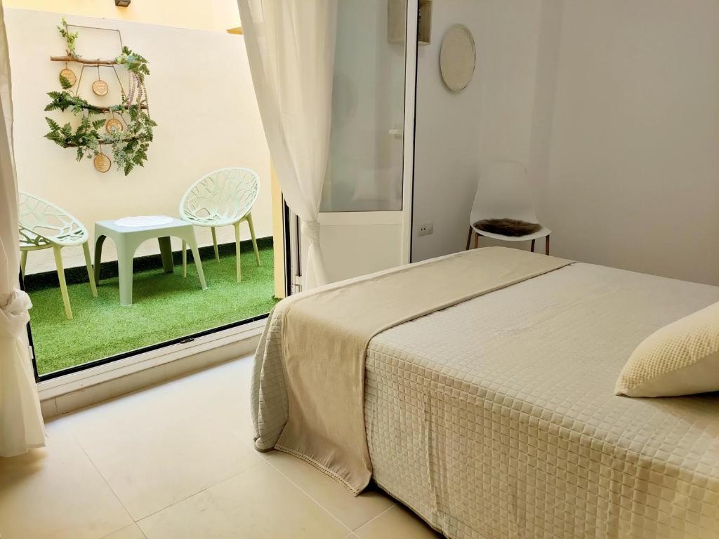 Posteľ alebo postele v izbe v ubytovaní RELAX CHICLANA-Aparcamiento privado-TV Cable-WifiPlus-Aire Acond-Incluido