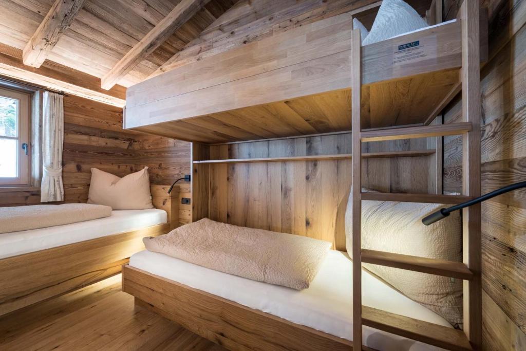 Postel nebo postele na pokoji v ubytování Chalet-karwendel