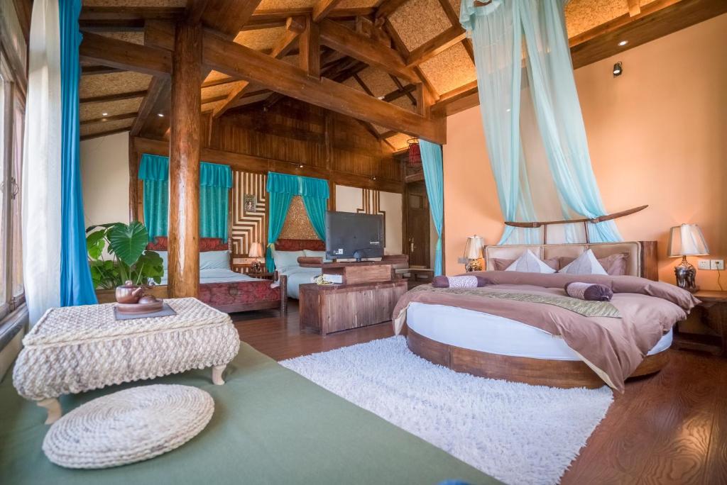 TV a/nebo společenská místnost v ubytování The Ritz-Man Boutique Inn Lijiang