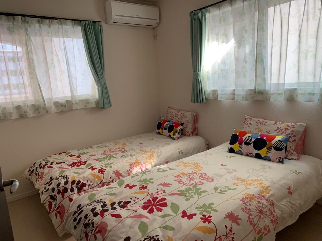 Letto o letti in una camera di Nara Guesthouse Kaede