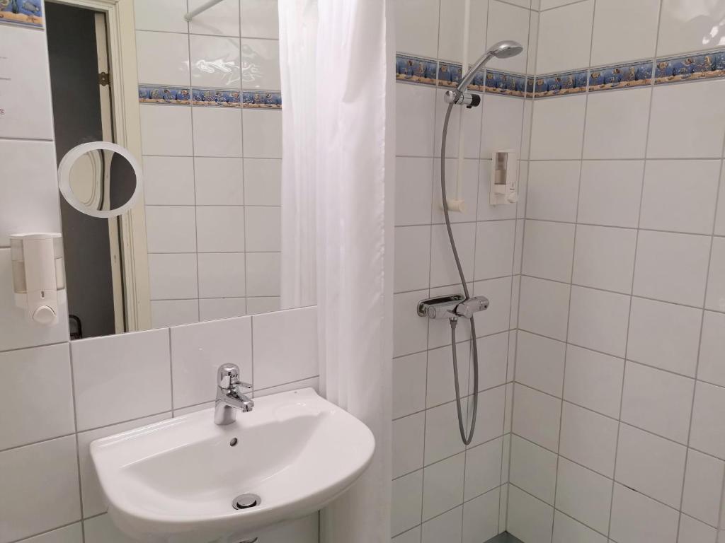 Koupelna v ubytování Hotel Lorensberg