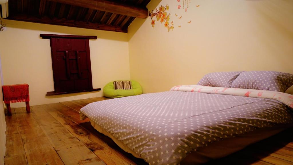 Postel nebo postele na pokoji v ubytování Pearl B&B