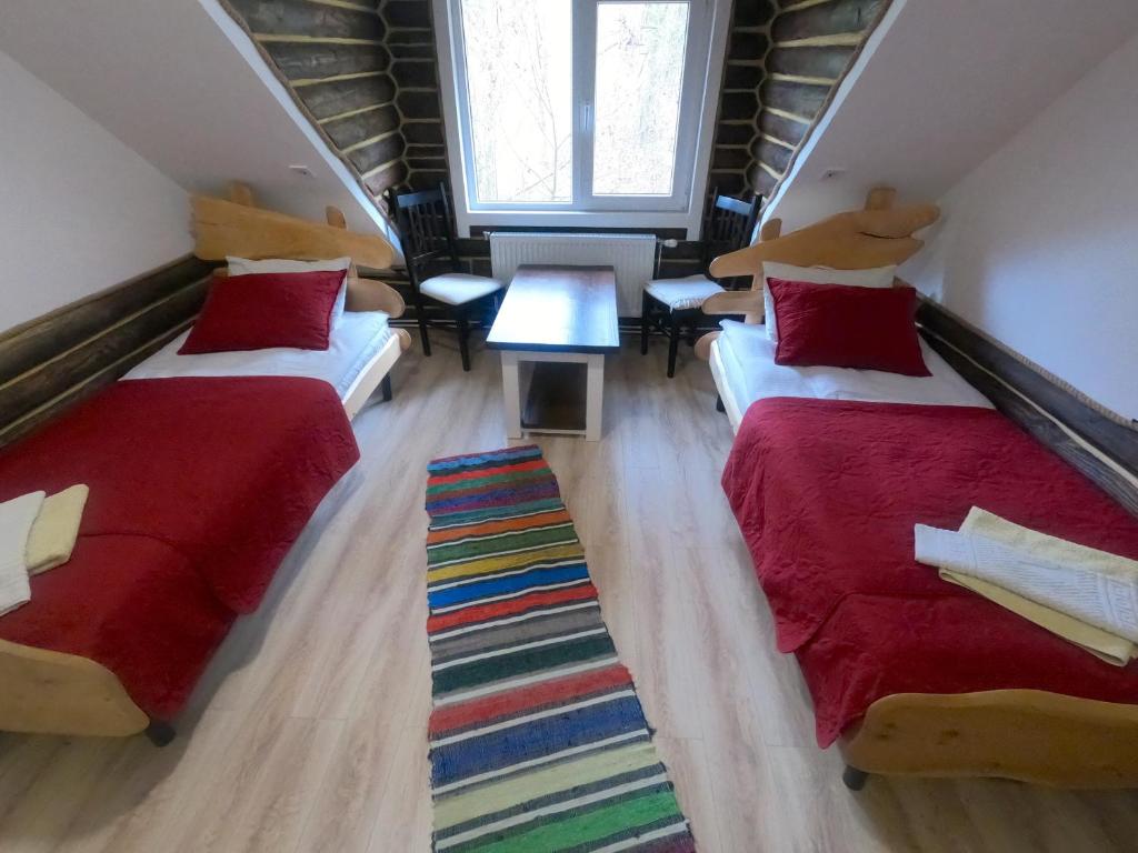 Postel nebo postele na pokoji v ubytování "LiAn" Family Hotel & Restaurant