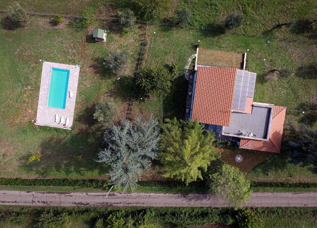 Bazén v ubytovaní Podere Campo del Piano alebo v jeho blízkosti