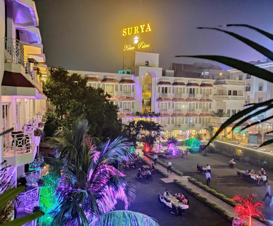 an aerial view of a resort at night at Hotel Surya, Kaiser Palace in Varanasi