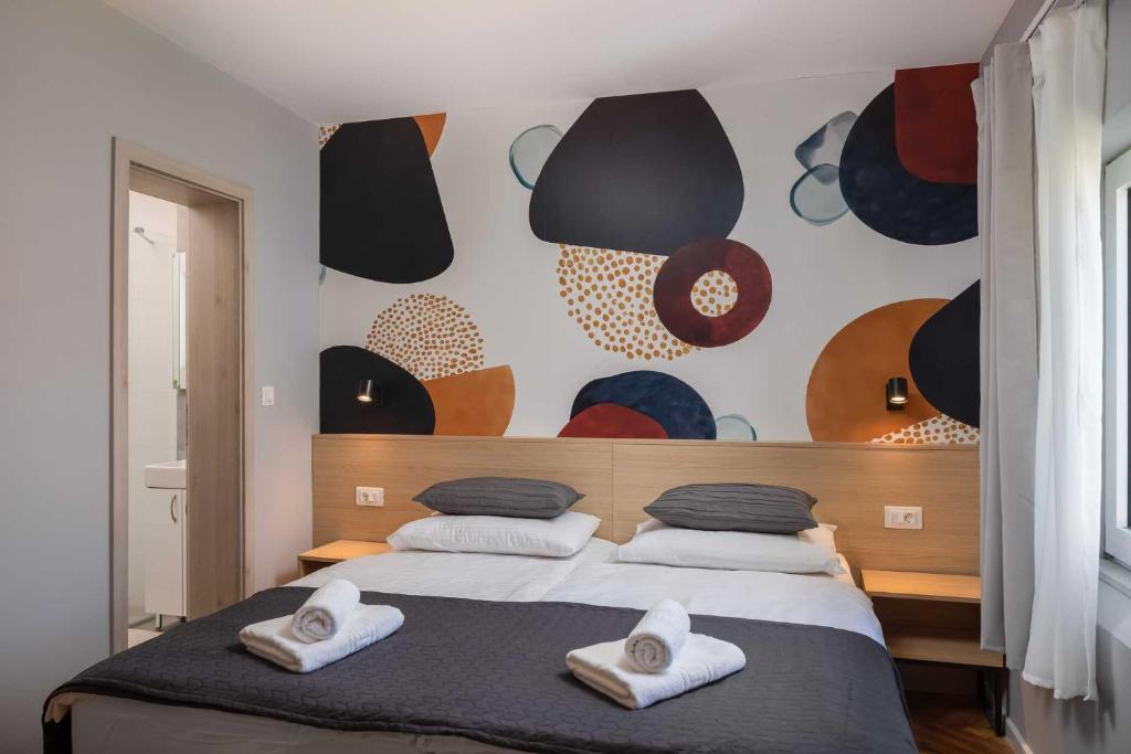 Postel nebo postele na pokoji v ubytování Solar Beach Inn