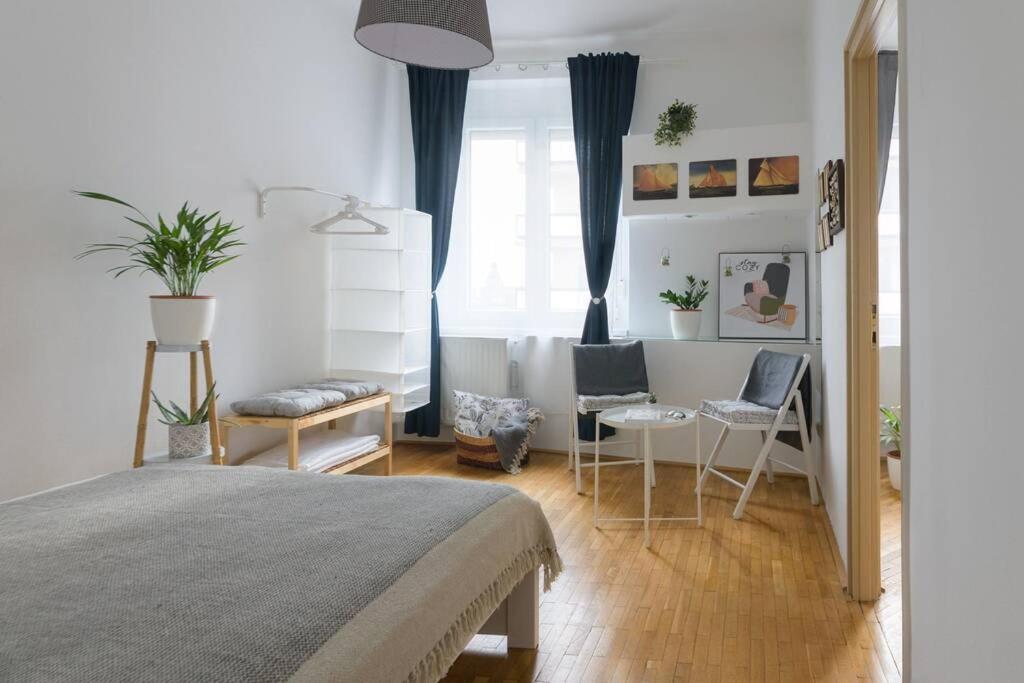 Posteľ alebo postele v izbe v ubytovaní Hygge Apartman