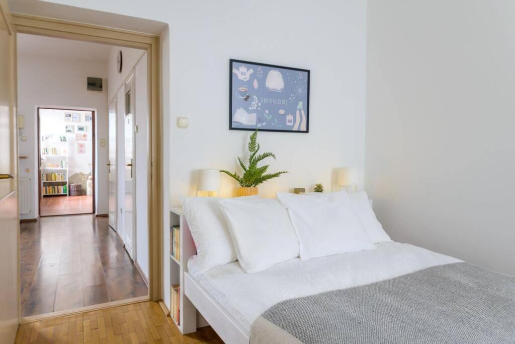 Posteľ alebo postele v izbe v ubytovaní Hygge Apartman