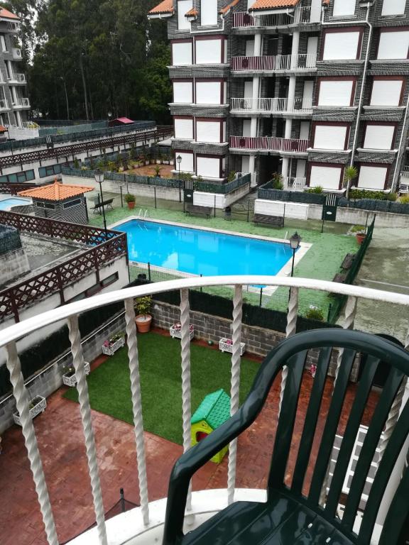 Bazén v ubytování Apartamento Noja Beach nebo v jeho okolí