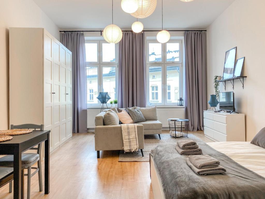 Posedenie v ubytovaní Cozy Apartment in the heart of Jewish District