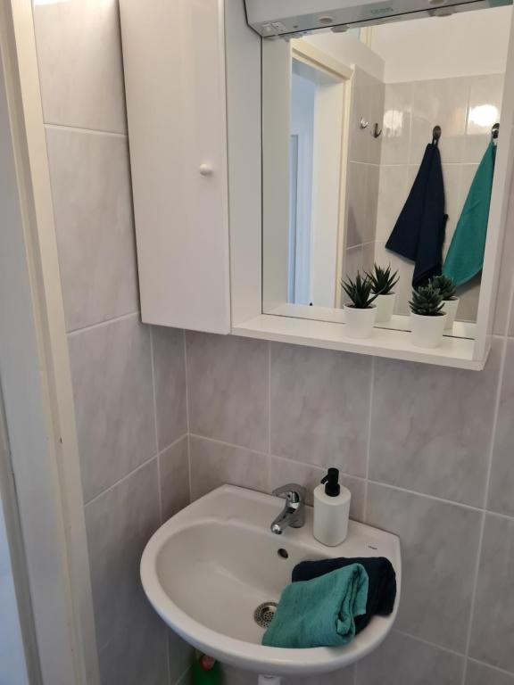 Kúpeľňa v ubytovaní Apartmani E&G
