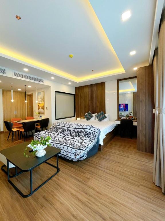 Postel nebo postele na pokoji v ubytování FLC Sea Tower - Căn Hộ Biển Quy Nhơn