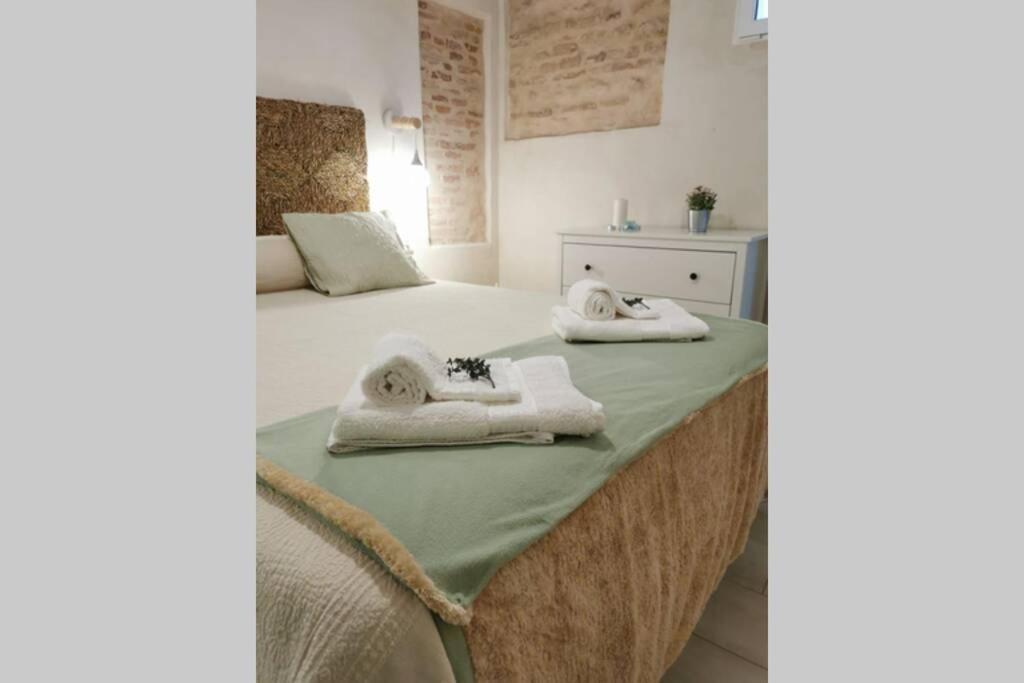 Ένα ή περισσότερα κρεβάτια σε δωμάτιο στο APARTAMENTO LA TEJA-parking privado