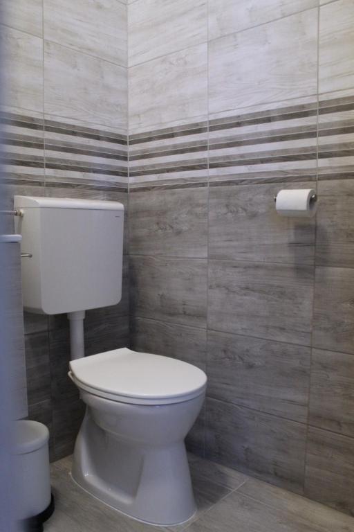 Koupelna v ubytování Altair Airport Apartman