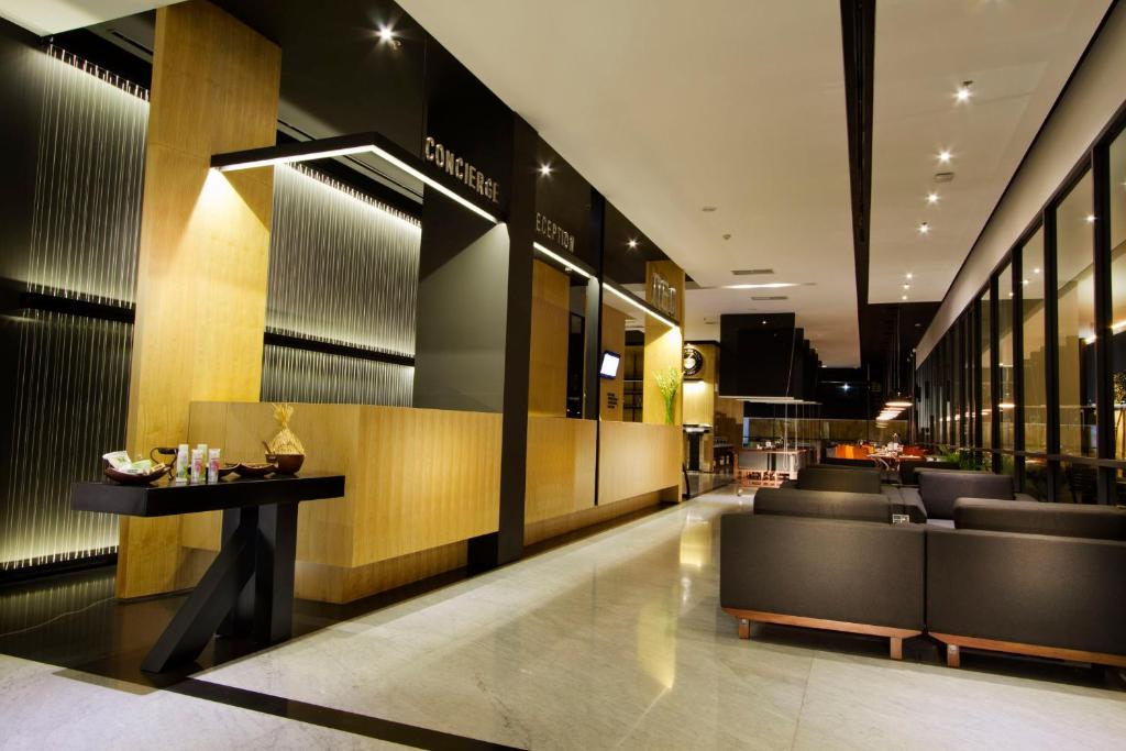 Posezení v ubytování Neo Hotel Tendean Jakarta by ASTON