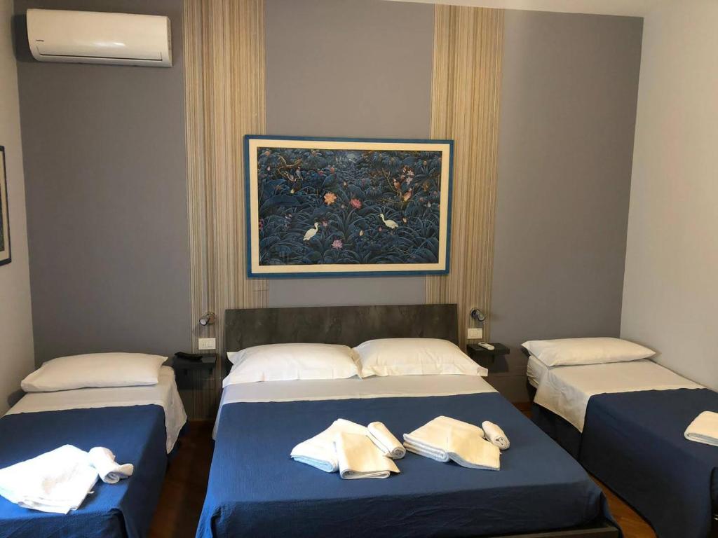 Postel nebo postele na pokoji v ubytování B&B SALento Garden