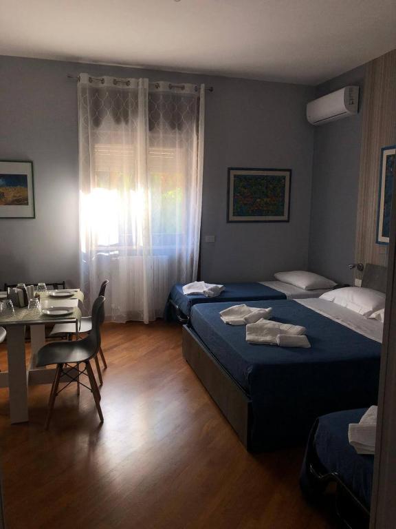 Postel nebo postele na pokoji v ubytování B&B SALento Garden